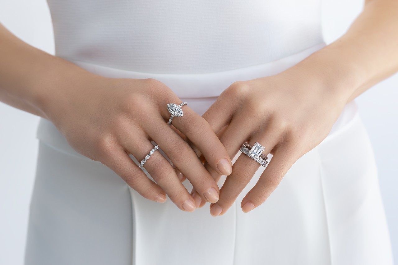 lady’s hands wearing TACORI bridal rings