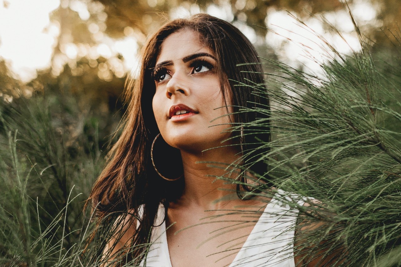 woman with hoop earrings