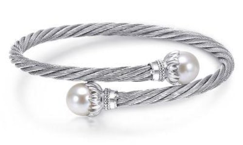 A sterling silver cuff from Gabriel & Co. features pearls and a rope-like texture