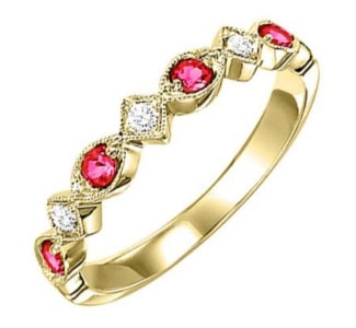 A ruby and diamond band from the Rottermond signature collection features 10k gold