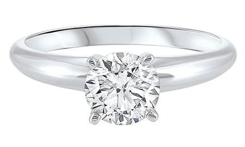 A white gold solitaire engagement ring with a lab-grown center diamond.