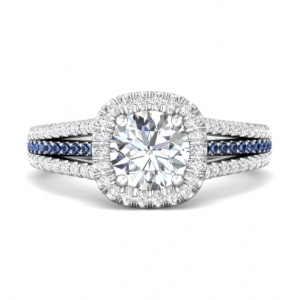 A split shank halo engagement ring with sapphire side stones from Martin Flyer.