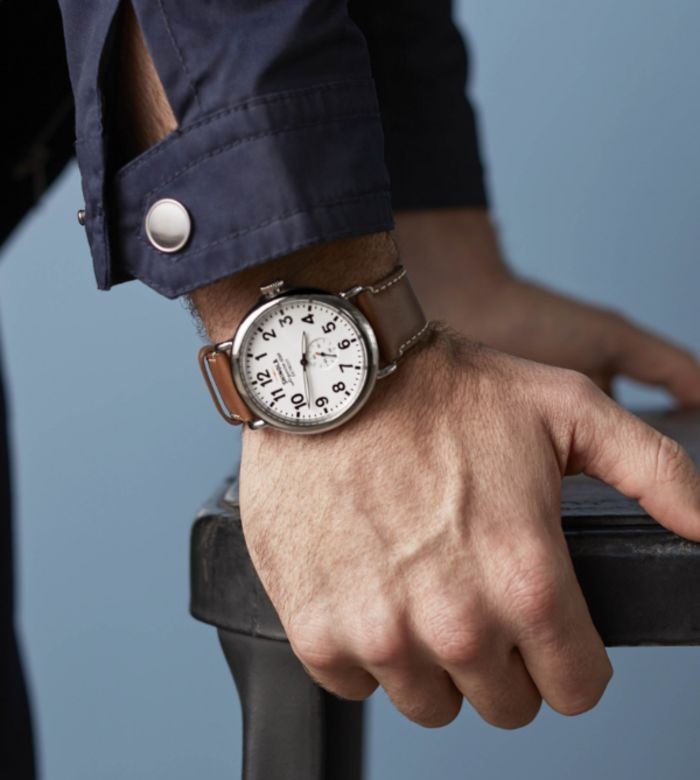 Man wearing a Shinola watch