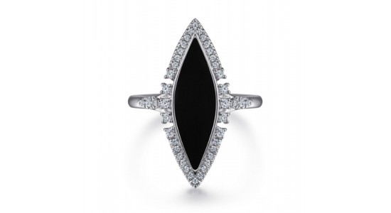 a white gold ring featuring a diamond shaped black onyx center stone and a diamond halo