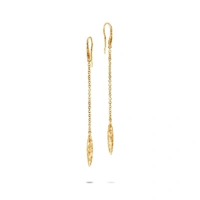 a pair of gold drop earrings from John Hardy.
