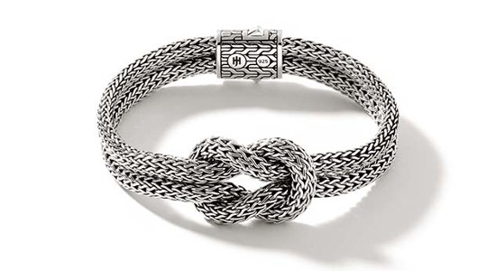 a sterling silver chain bracelet from John Hardy featuring a large knot