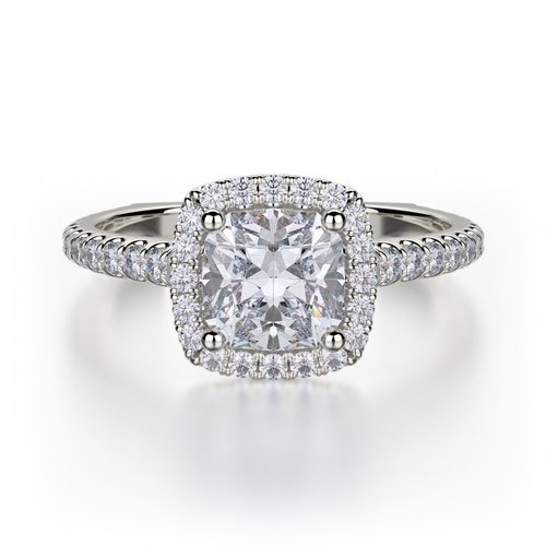 A white gold diamond encrusted halo engagement ring by Michael M.