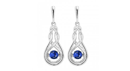 a pair of silver drop earrings featuring round cut sapphires