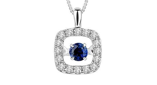 a white gold pendant necklace featuring a sapphire that appears to float inside a square of diamonds