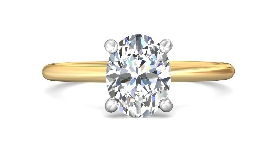 a mixed metal solitaire engagement ring with an oval cut diamond