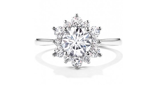 a floral-inspired halo engagement ring with a white gold setting