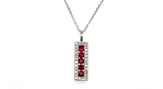 A white gold bar pendant necklace with channel set rubies and diamonds from Marry Ann Diamonds, available at Rottermond Jewelers.