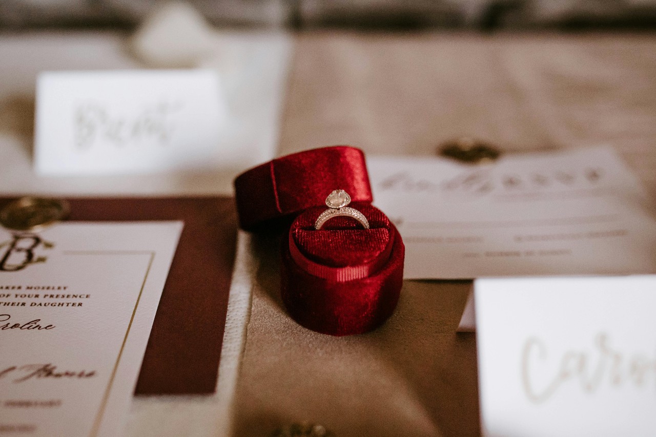 a designer engagement ring inside a red box