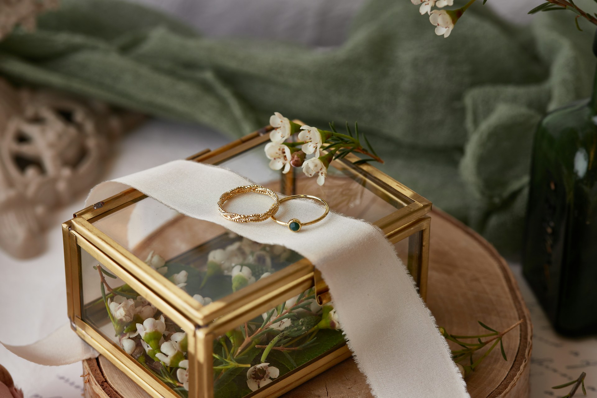 A close-up of an elegant bridal stack displayed on a delicate jewelry box. A close-up of an elegant bridal stack displayed on a delicate jewelry box.